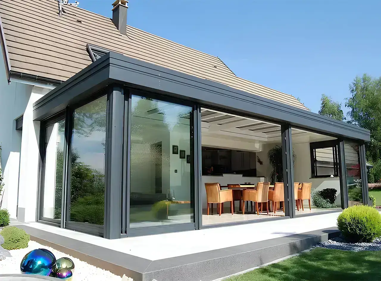 véranda Cocooon à toiture plate moderne et design